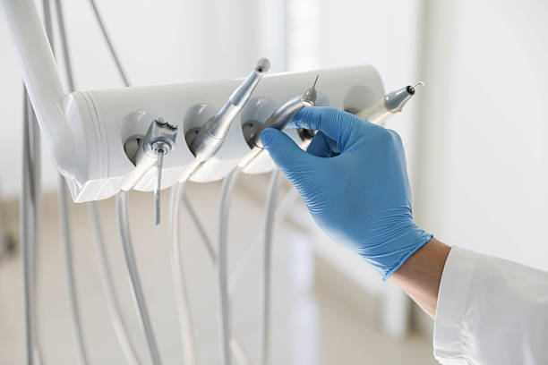 Professional Tooth Extraction technician working in Providence, RI